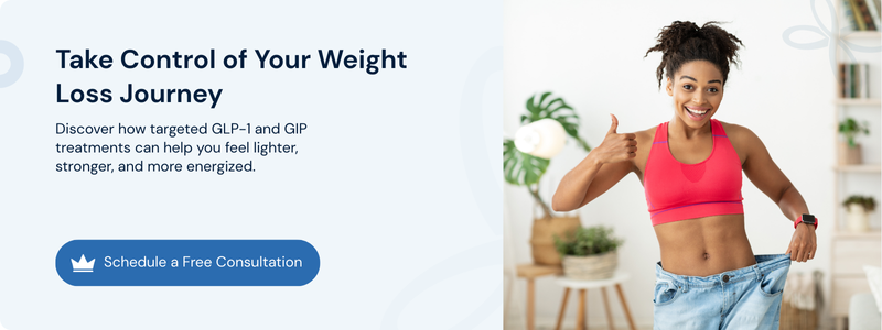 Smiling woman in oversized jeans shows weight loss progress from GLP-1 and GIP therapy